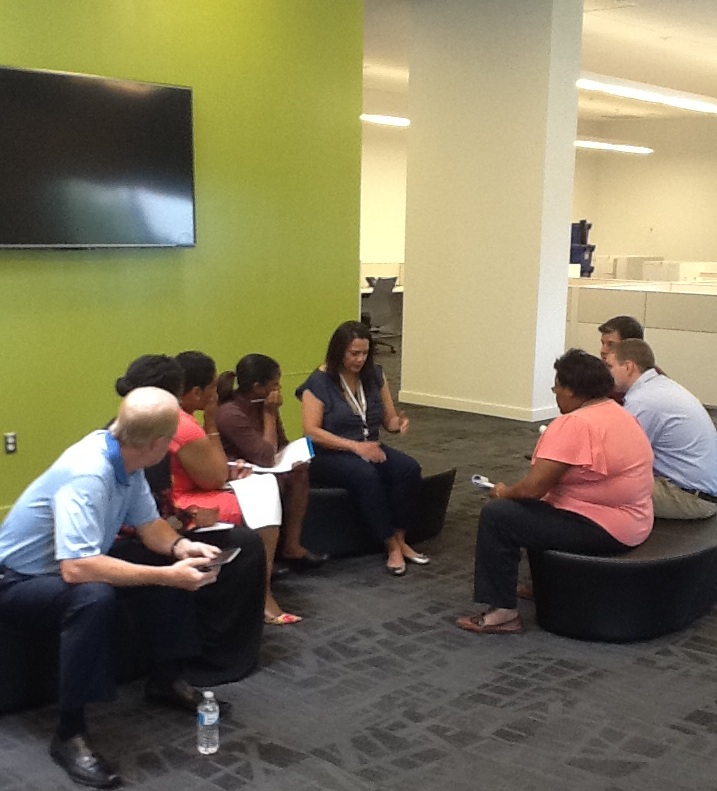 POC employees meeting photo