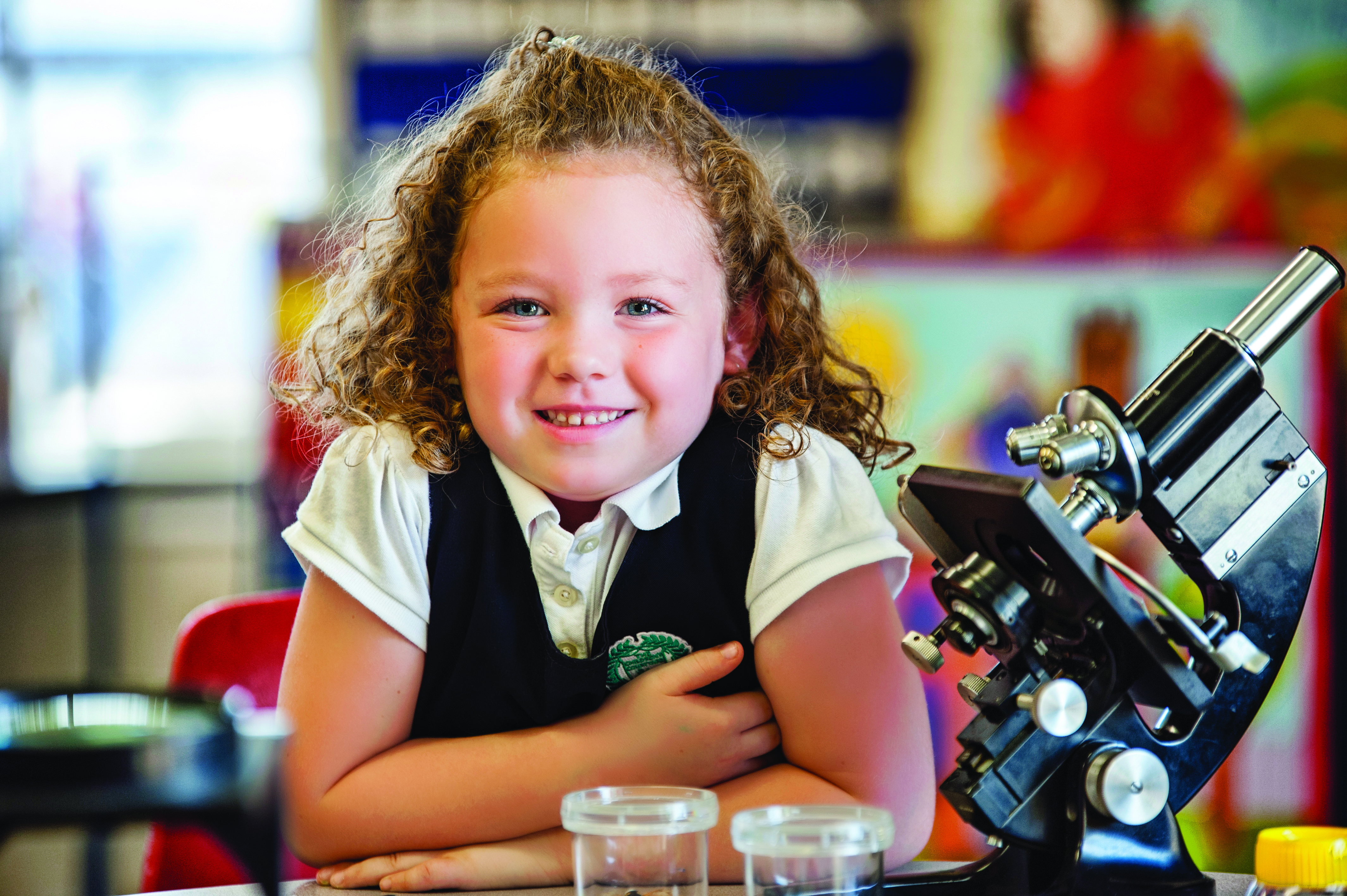 CCY student with microscope